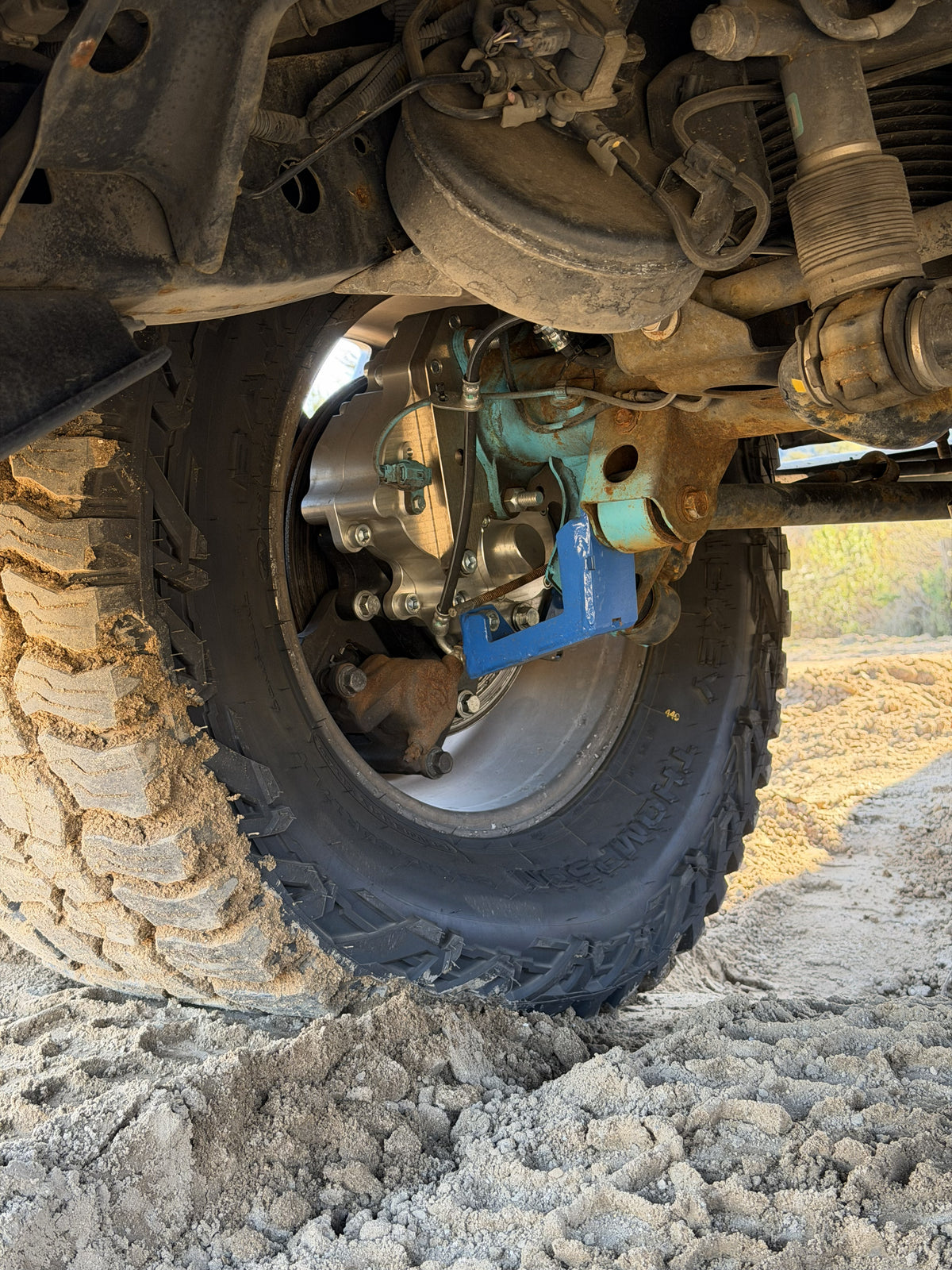 Close up view of Portal Pros Lexus and Toyota portal axles installed on the rear axle of a GX470