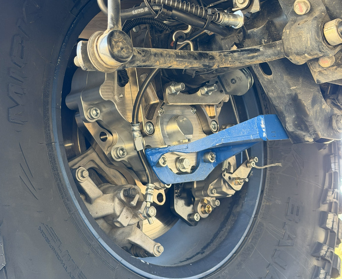 Close up view of Portal Pros portal axles on the rear left of a Jeep Gladiator 