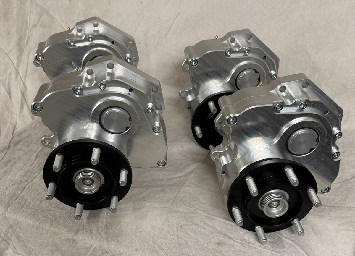 Close up view of four Portal Pros Toyota and Lexus portal axles on the bench