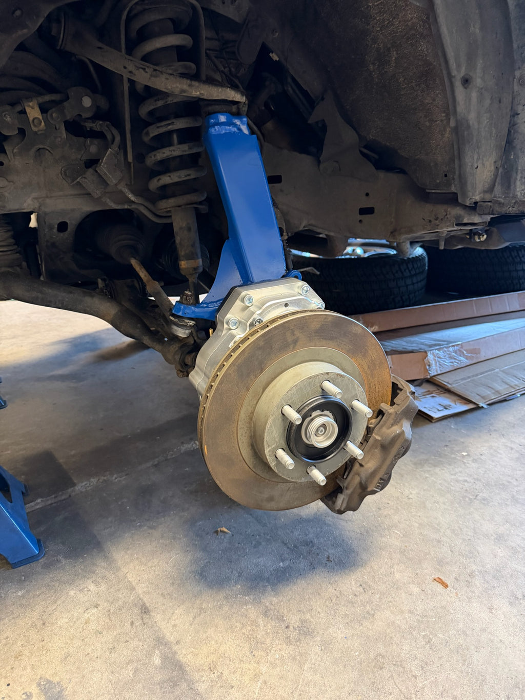 Close up of Portal Pros portal axle installed on the front knuckle of a GX470 Tacoma 4runner