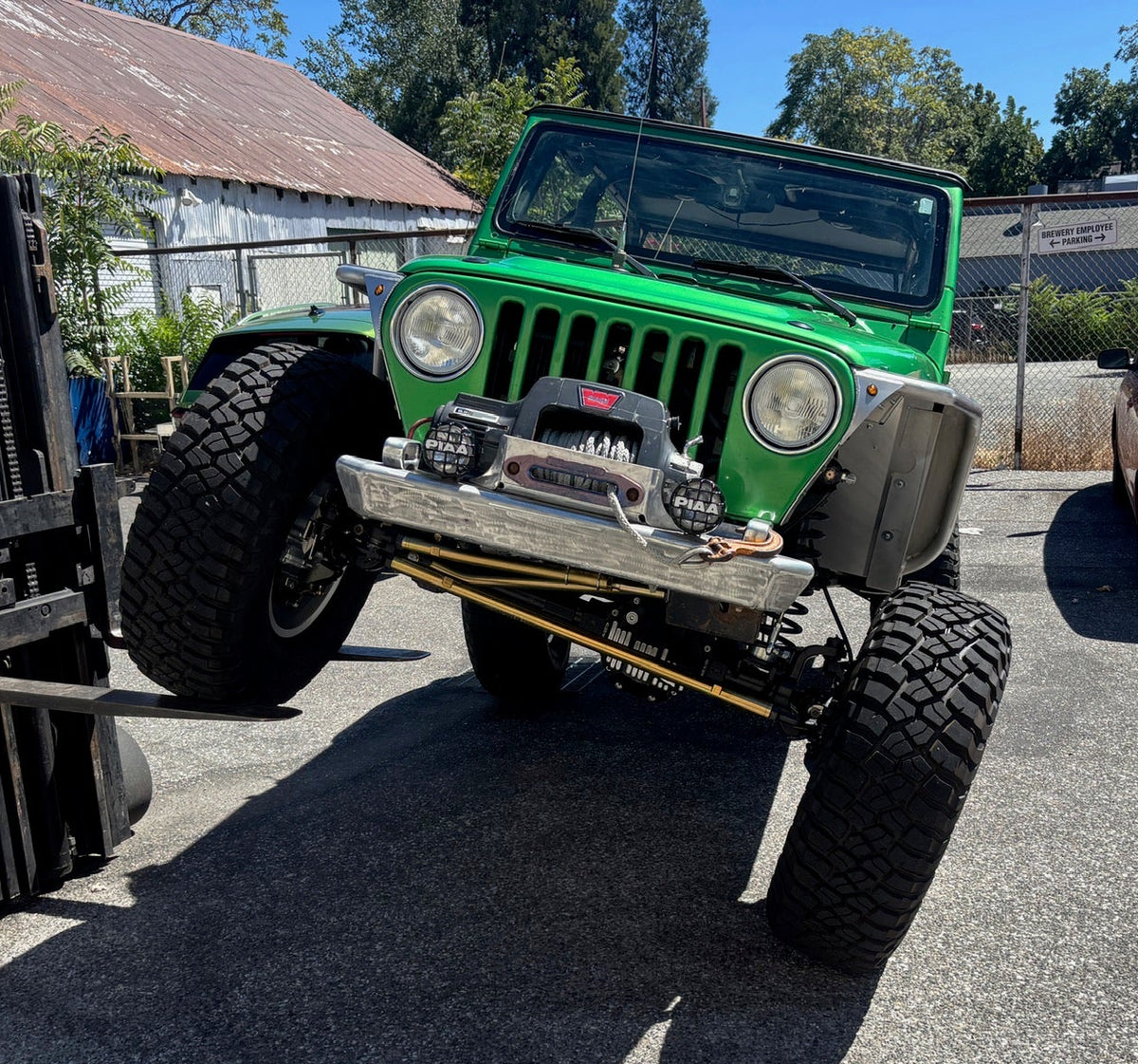 Portal Pros bolt-on portal axles installed on a Jeep Wrangler TJ Rubicon Unlimited also known as an LJ - front view