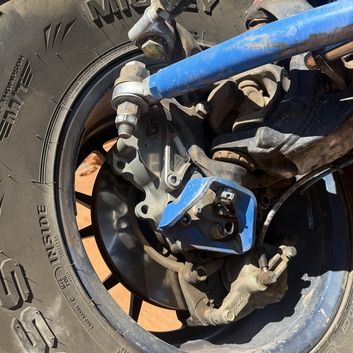 Close up view of Portal Pros portal axle installed on the front right corner of a Jeep Wrangler JK
